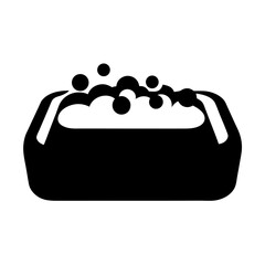 Black silhouette of a washbasin filled with soapy water and bubbles