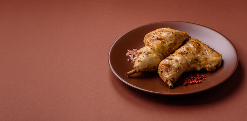 Grilled chicken leg or quarter. Barbecued meat with salt and spices