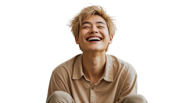 Happy young man laughing