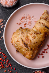 Grilled chicken leg or quarter. Barbecued meat with salt and spices