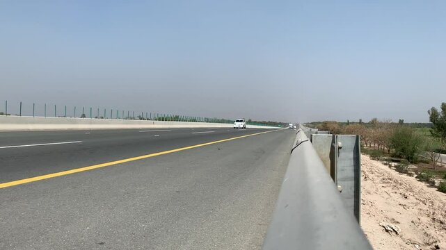 PAKISTAN PUNJAB 2024 19 MAY: Truck. Pakistani Truck on the motorway towards Lahore ring road. CPEC. China to Pakistan. loading truck with gas and oil. Transportation. Pakistani transport. Motorway M5.