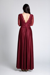 This Stunning and Elegant Burgundy Evening Gown Features Beautiful Lace Details for a Unique Look