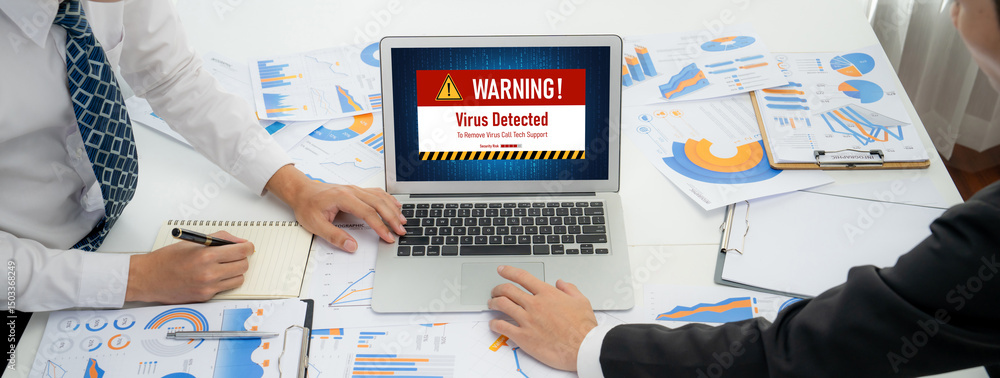 Poster virus warning alert on computer screen detected brisk cyber threat , hacker, computer virus and malw
