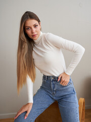 Young model showcasing modern fashion in a stylish urban setting