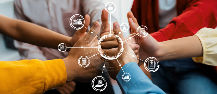 A dynamic scene capturing diverse hands joining together, symbolizing teamwork and collaboration in a business environment, enhanced by digital technology icons. Amity