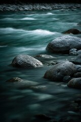 Obraz premium River runs through rocks, long exposure on a winter day