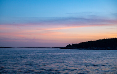 Naklejka premium Layers of Sunset Light Across Shore of Acadia