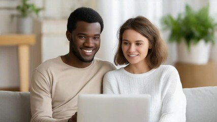 Modern couple enjoying technology in cozy living room - Powered by Adobe