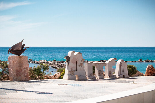 Altea sign at modern seaside promenade. Altea is a picturesque coastal town in Spain, Marina Baixa, Alicante province, Spain