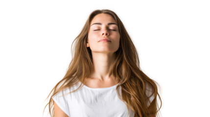 Serene woman enjoying a moment of peace with closed eyes and flowing hair.
