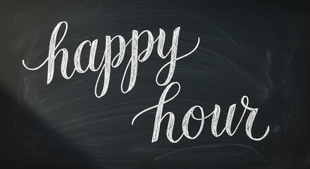 Chalkboard menu with happy hour text in decorative lettering  