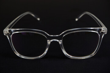 transparent eye wear closeup shot on black background 