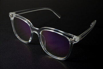transparent eye wear closeup shot on black background 
