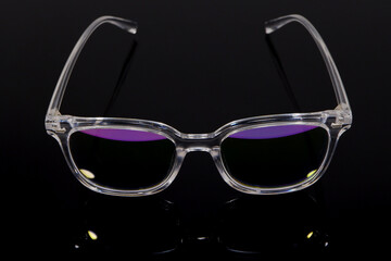transparent eye wear closeup shot on black background 