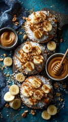 Fototapeta premium Overhead Shot of Three Rice Cakes Topped with Banana, Peanut Butter, Honey and Coconut