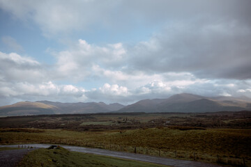 Fototapeta premium The hills of Scotland in the fall. Beautiful light, sky