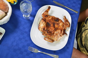 Crispy Fried or Roasted Meat Dish with Traditional Garnishes
