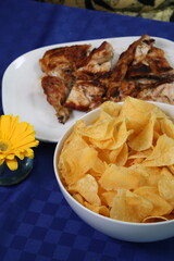 Crispy Fried or Roasted Meat Dish with Traditional Garnishes