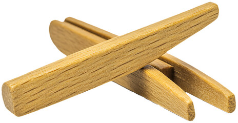 Close up of three wooden sticks arranged on top of each other