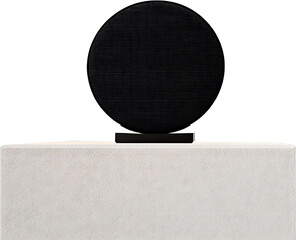A modern speaker on a white textured surface black backdrop