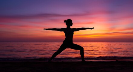 silhouette of a woman doing yoga on the beach