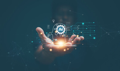 Artificial intelligence or AI of futuristic technology concept, Hand holding virtual AI technology and network equipment icon, Internet of Things, futuristic innovation, smart communication network.
