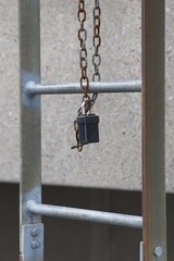 Locked Metal Ladder with Chain and Padlock