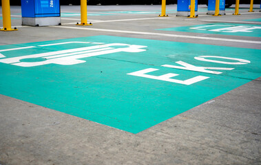 Eco-friendly parking spot with green design elements — grass paving, sustainable layout, and...