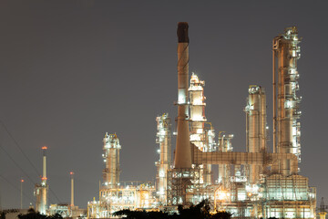 Fototapeta premium Oil gas refinery plant in Sriracha District, Chonburi Province. May called petroleum or petrochemical plant. Industrial factory with steel pipe, pipeline to production gasoline fuel, power energy.