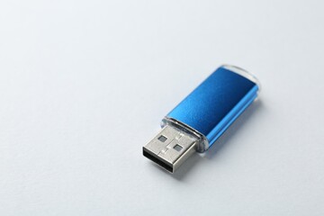 One flash drive on white background, closeup