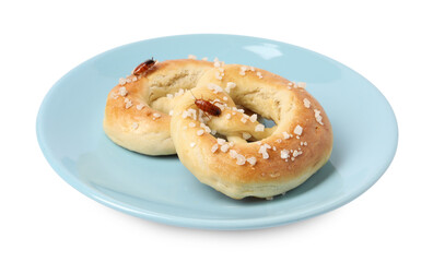 Cockroaches crawling on salted pretzels against white background