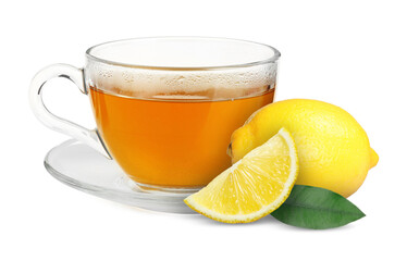 Tea in glass cup and fresh lemons on white background