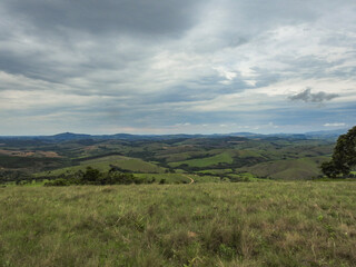 landscape with hills and moody sky