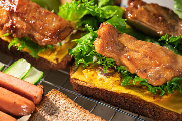 Delicious Grilled Meat Sandwiches with Fresh Lettuce and Cheese