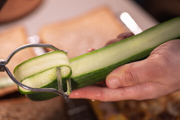 Slicing a Cucumber with a Peeler
