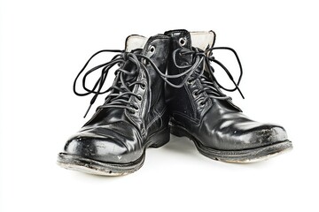 Pair of worn black leather boots.