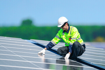 Engineer service check installation solar cell on the roof of factory , Sustainable energy industry concept, Renewable energy solution for climate change