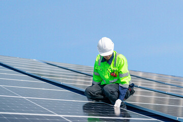 Engineer installs solar cells check installation solar cell on the roof Sustainable energy industry concept Renewable energy solutions for climate change..