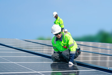 Engineer team installs solar cells check installation solar cell on the roof Sustainable energy industry concept Renewable energy solutions for climate change..