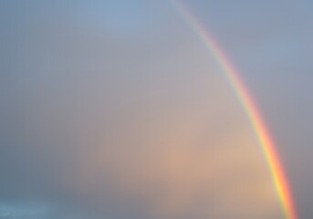 AI-Generated Minimalist AI Background of Soft Rainbow in Pastel Sky with Negative Space