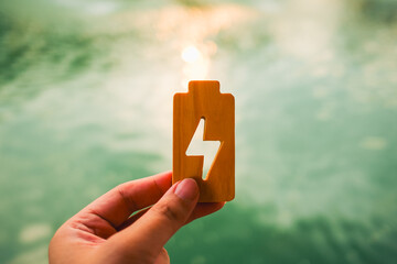 Technology battery high power electric energy with a connected charging cable. Battery to electric...