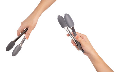 Hand holding kitchen tongs on white background