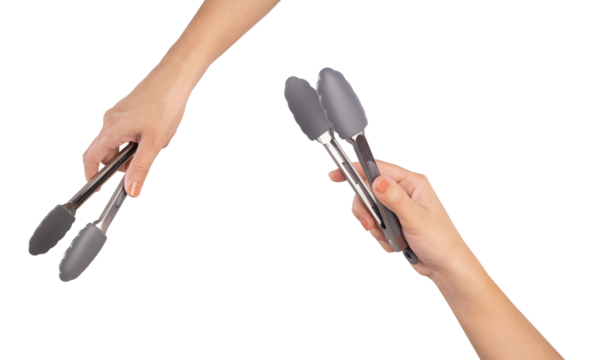 Hand holding kitchen tongs on white background