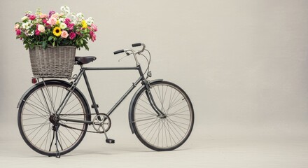 Charming Vintage Bicycle Adorned with a Basket Overflowing with Colorful Flowers