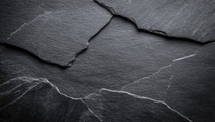 Dark gray slate stone texture with intricate patterns
