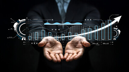 Businessman Presenting Digital Graph with Growth Metrics and Data Visualization on Hands against Black Background in Modern Style
