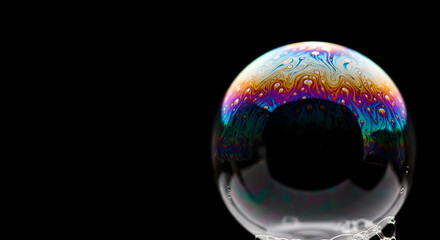 Abstract macro shot of iridescent soap bubble