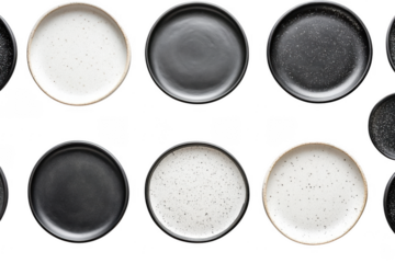 Collection of speckled black and white plates isolated on transparent background
