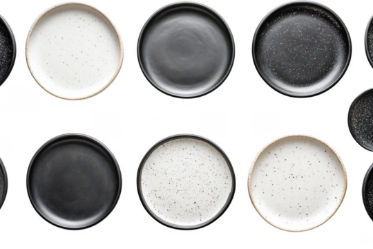 Collection of speckled black and white plates isolated on transparent background