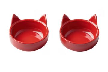 Two red cat shaped pet bowls isolated on transparent background